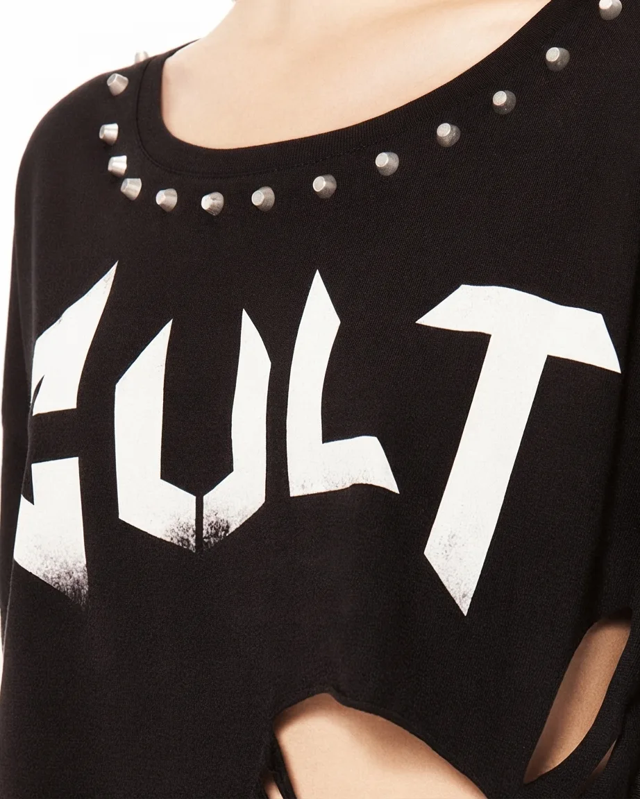 Studded 1x1 rib neckline on the crop tee, shot close