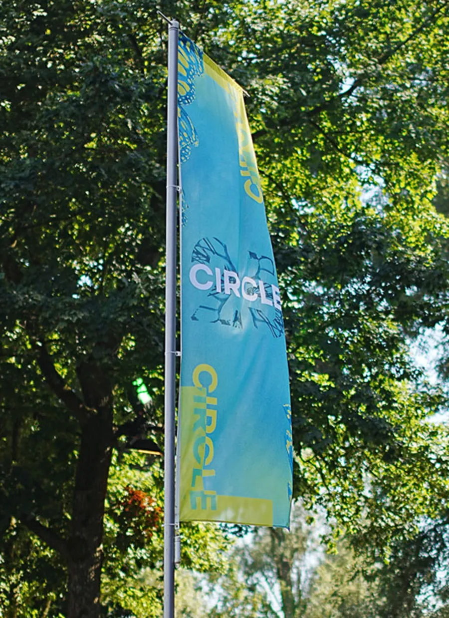 Flags hanging between the trees at Sloterpark